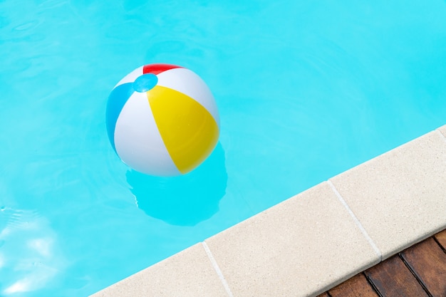 Colorful Beach Ball Floating on a swimming pool.