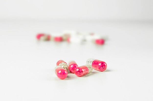 Colorful beads on a white background Pink and white beads