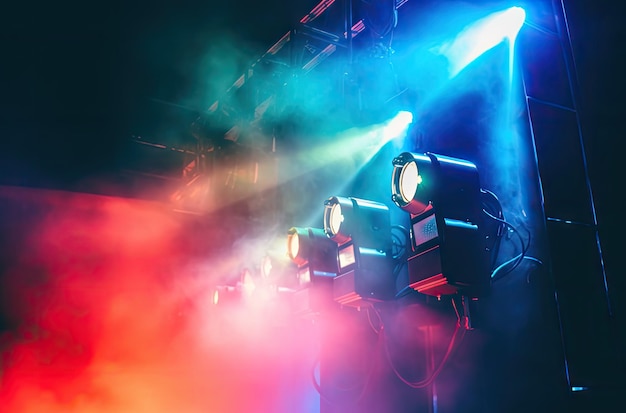 Photo colorful beams of bright laser light illuminating music venue during performance