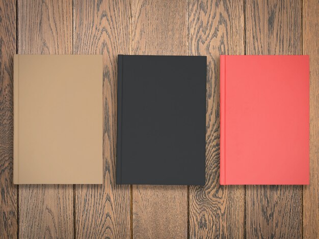 Colorful blank books on wood table