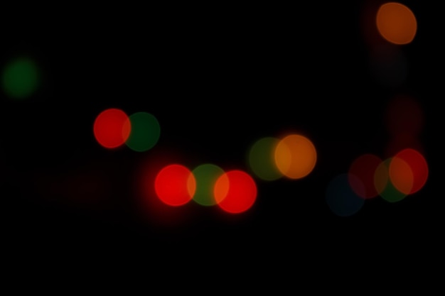 Colorful bokeh lights on black background