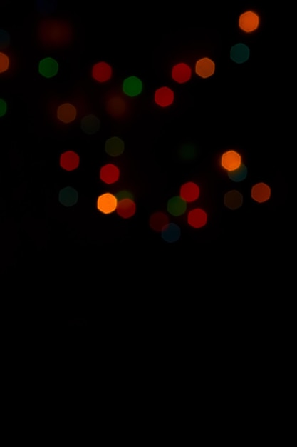 Colorful bokeh lights on black background