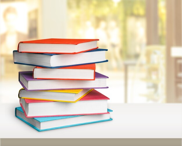 Premium Photo | Colorful books collection on background.