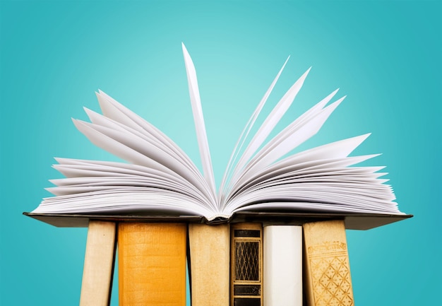 Colorful books collection on  background.