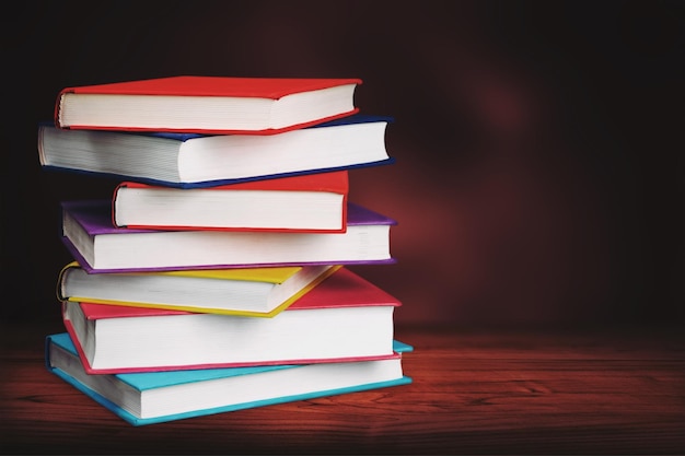 Premium Photo | Colorful books collection on background.