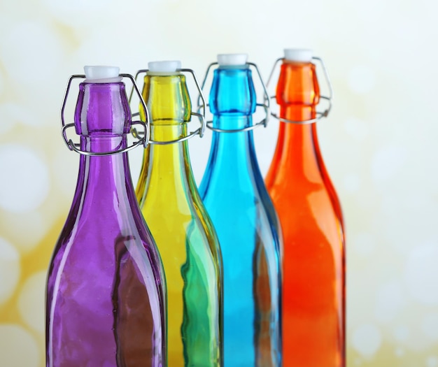 colorful bottles on light background