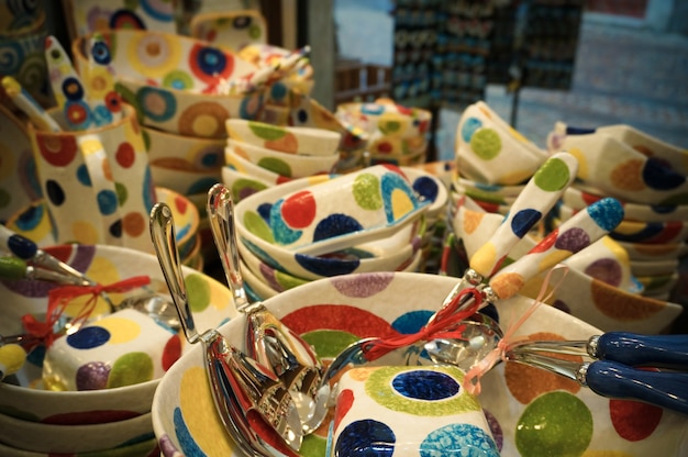 Colorful bowls on sale in ceramic shop