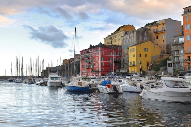 Colorful buildings and boats in the port of Bastia in Corsica