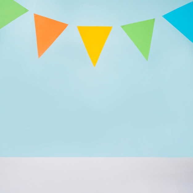 Photo colorful bunting on blue background