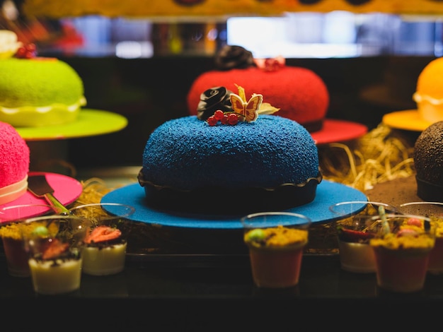 Colorful cakes at a hotel buffet