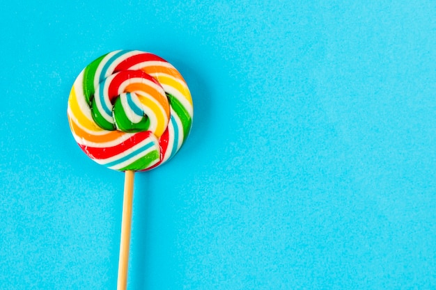 Colorful candies, lollypop on the color background, multicolored
