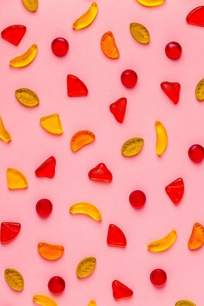 Colorful candies pattern on a bright background