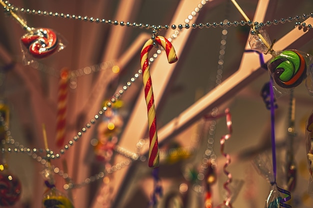 Colorful candies and sweets are hung as decorations Closeup