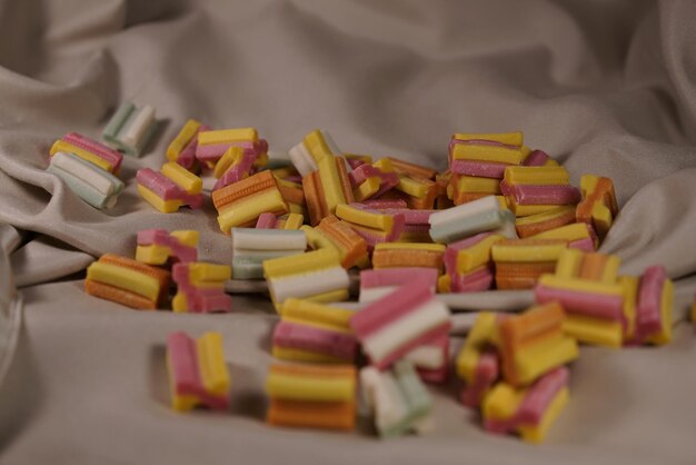 Colorful candies on tablecloth