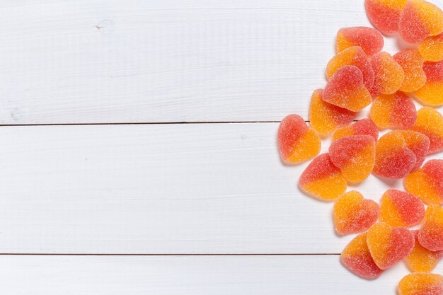 Colorful candies on wooden