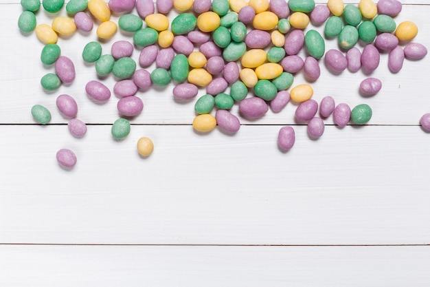 Colorful candies on wooden 