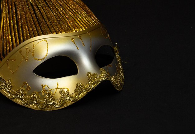 Colorful carnival mask on a black background