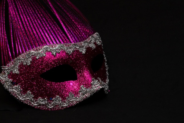 Colorful carnival mask on a black background