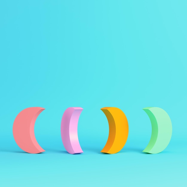 Colorful cartoon style moons on bright blue background in pastel colors Minimalism concept