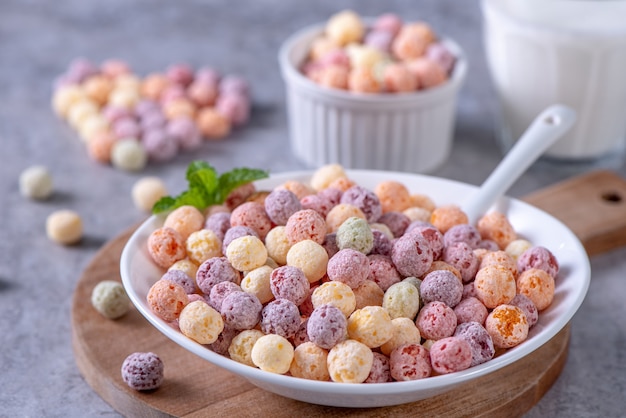 Colorful cereal corn balls mix, fruit flavor bowl sweets