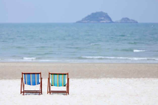 Colorful chairs on tropical beach