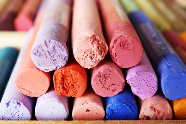 Colorful chalk pastels in box close up