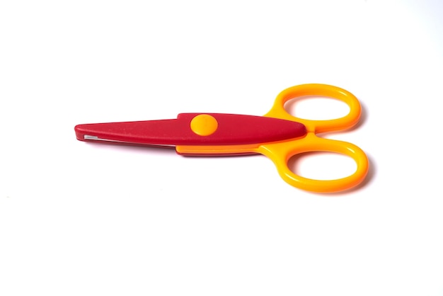 Colorful child scissors on a white background