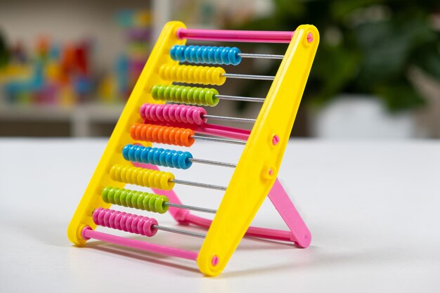 Colorful children's abacus on the table Mathematics arithmetic for preschool and school children learning to count