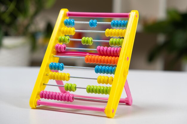 Colorful children's abacus on the table Mathematics arithmetic for preschool and school children learning to count