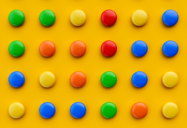 Красочные шоколадные конфеты, выделенные на оранжево-желтом фоне Вид сверху 3d иллюстрация