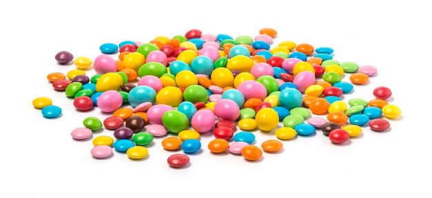 Colorful chocolate candy pills isolated on white background