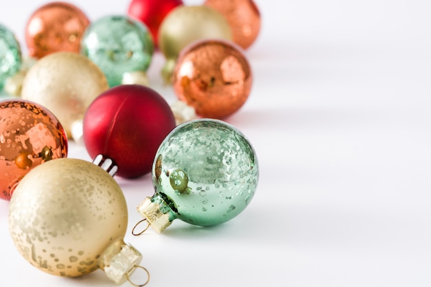 Colorful christmas balls isolated on white  copyspace