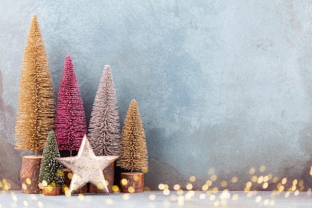 Colorful Christmas tree on blue background.