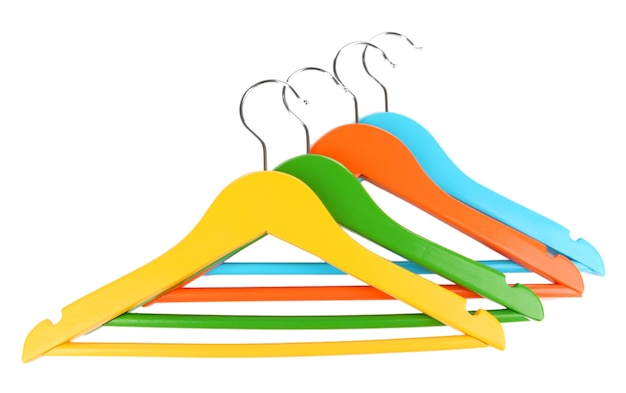 Colorful clothes hangers isolated on white