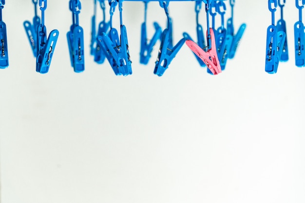 Colorful clothespin clothespins on the hangers