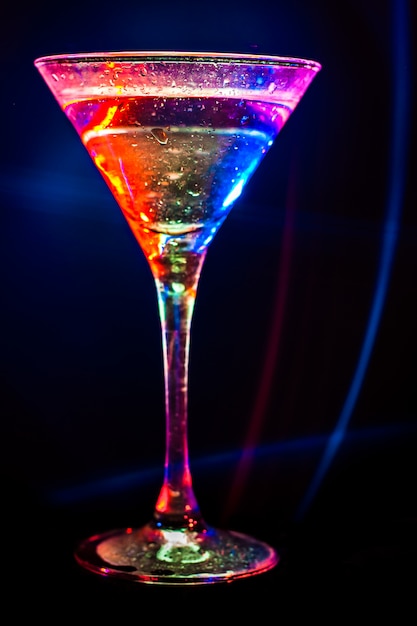 Colorful cocktail in a martini glass