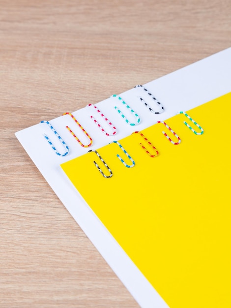 Colorful collection set of Paper Clips on white paper ready for your design