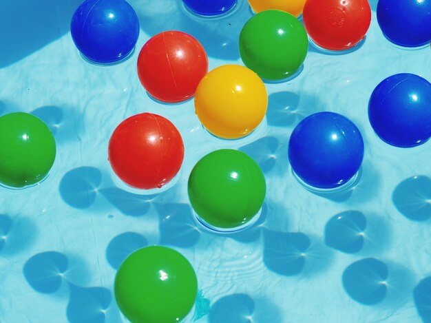 colorful colorful objects on tiled floor