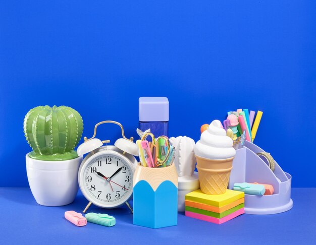 Colorful compositions of stationery office table with supplies