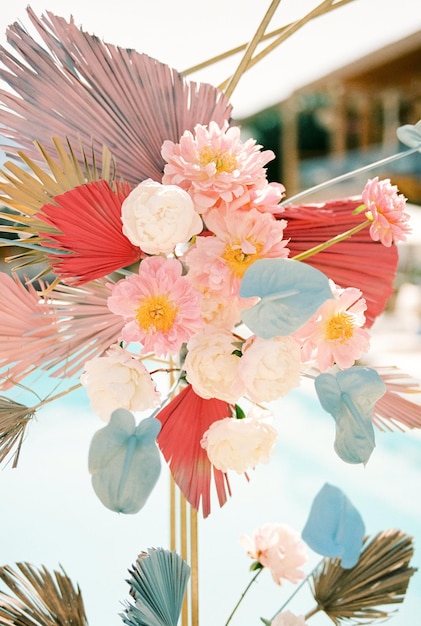 Colorful corner of a wedding arch decorated with flowers