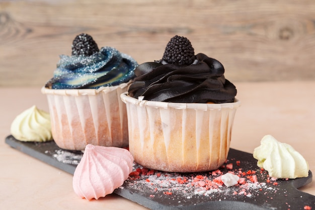 Colorful cupcakes with different Tastes. Small beautifull cakes