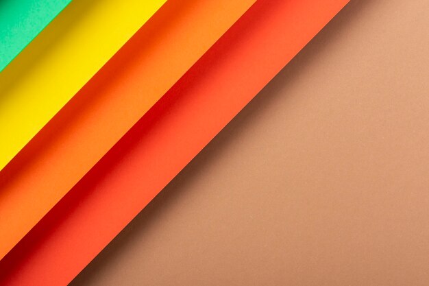 Colorful design of the folded paper material. Top view, flat lay.