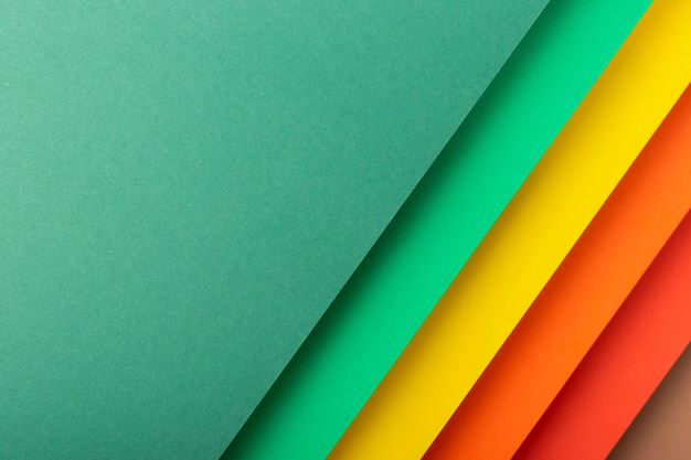Colorful design of the folded paper material. Top view, flat lay.