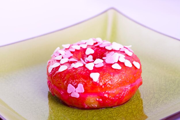 Colorful donut on a plate