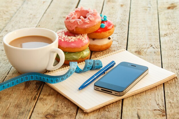 Colorful donuts and notepad