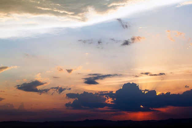 colorful dramatic sky with cloud at sunset