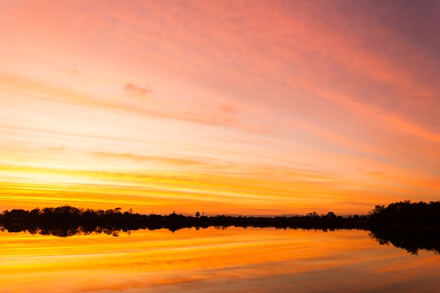 Colorful dramatic sky with cloud at sunset