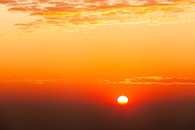 Colorful dramatic sky with cloud at sunset.