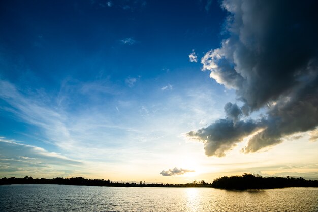 Colorful dramatic sky with cloud at sunset.