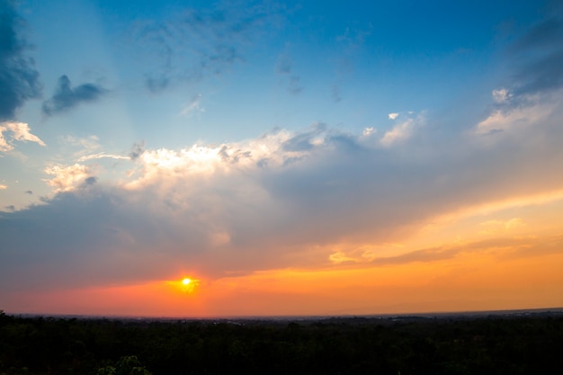 Colorful dramatic sky with cloud at sunset.